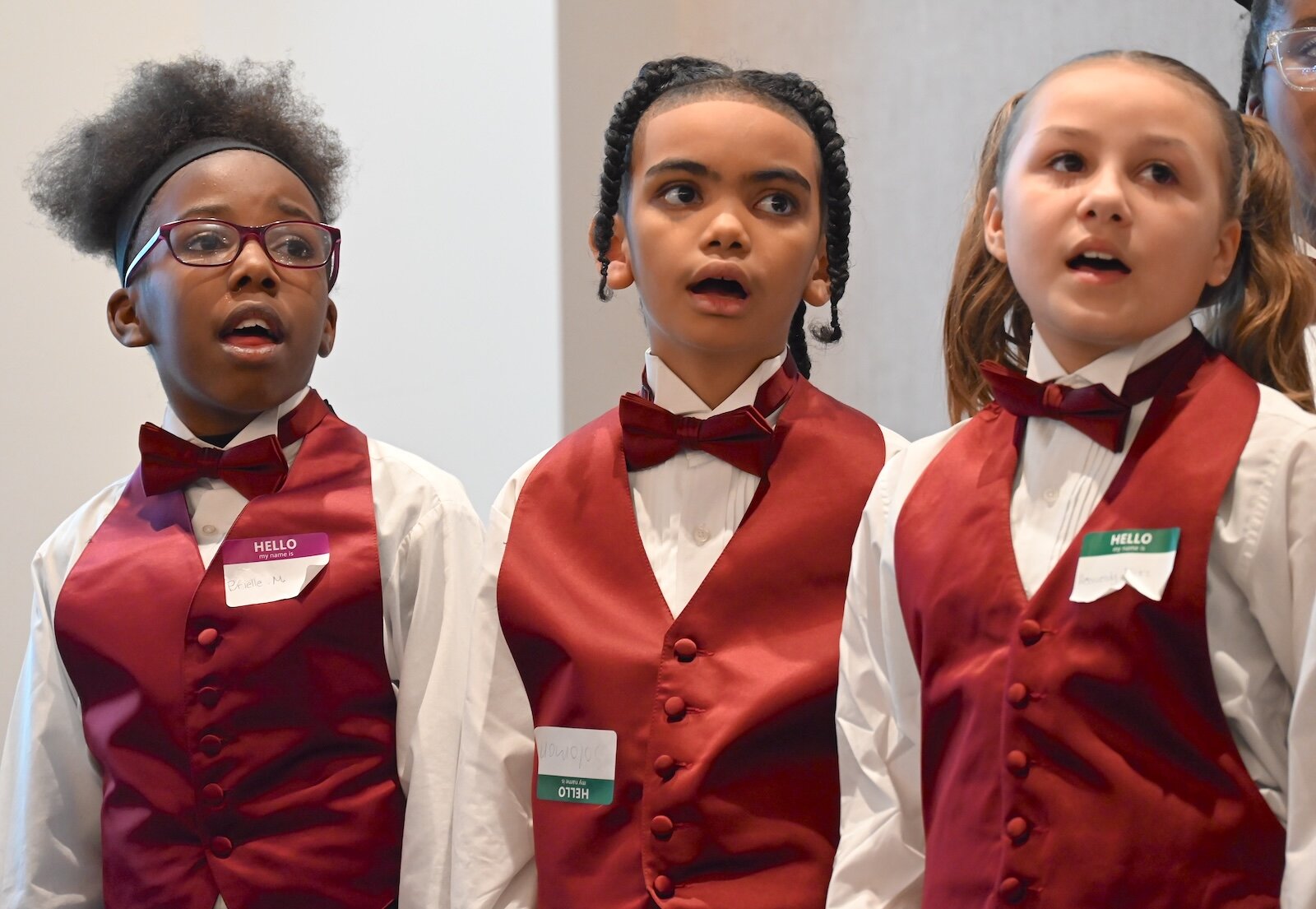  Members of the Sojourner Truth Choir sing during a performance at the National Day of Racial Healing event from left, Brielle, Solomon, and Heaven