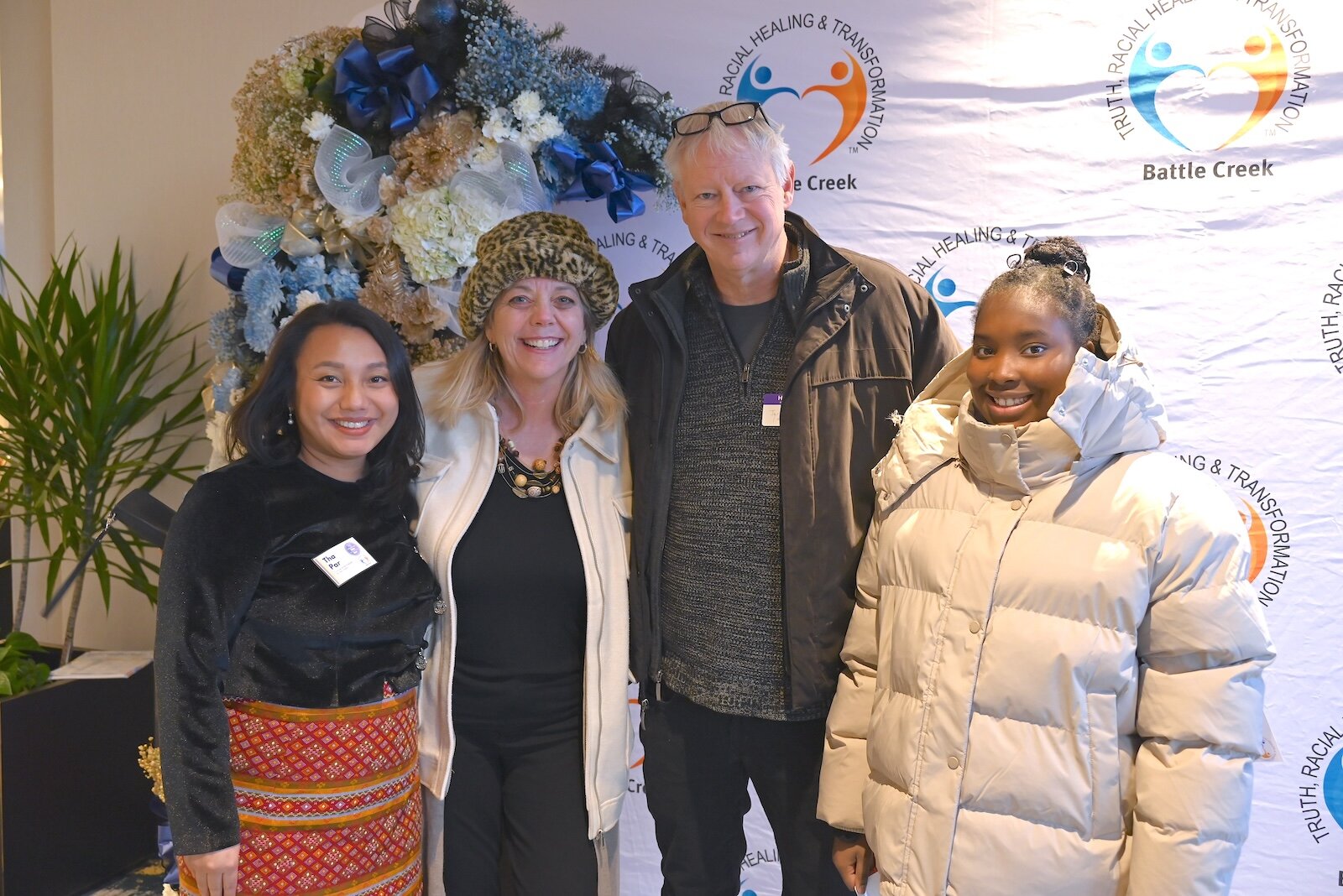 Posing for a photo at the National Day of Racial Healing event are from left, Tha Par, Laura Williams, Jason Williams, and Amari White.