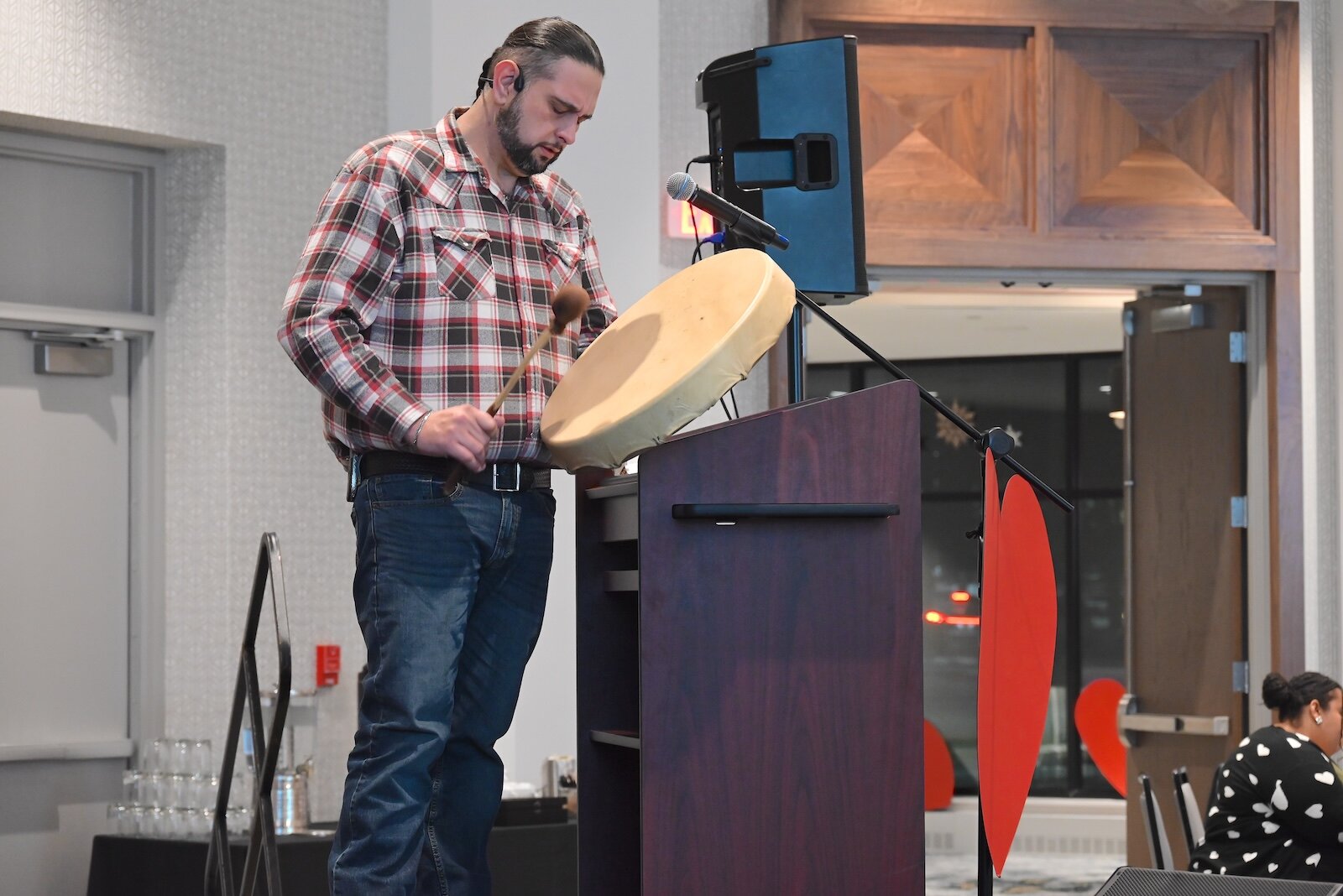 Fred Jacko of the Grand Traverse Band of Ottawa and Chippewa Indians sings and plays a drum during Battle Creek Truth, Racial Healing, and Transformation’s (BCTRHT) National Day of Racial Healing event.