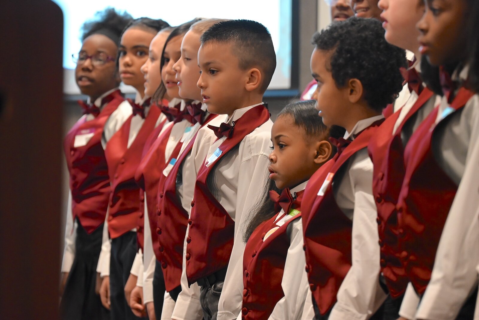 Members of the Sojourner Truth Choir sing during the National Day of Racial Healing event.