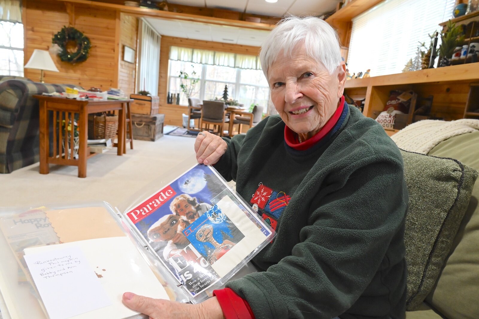 Cathy Campbell displays some of her treasured napkins.