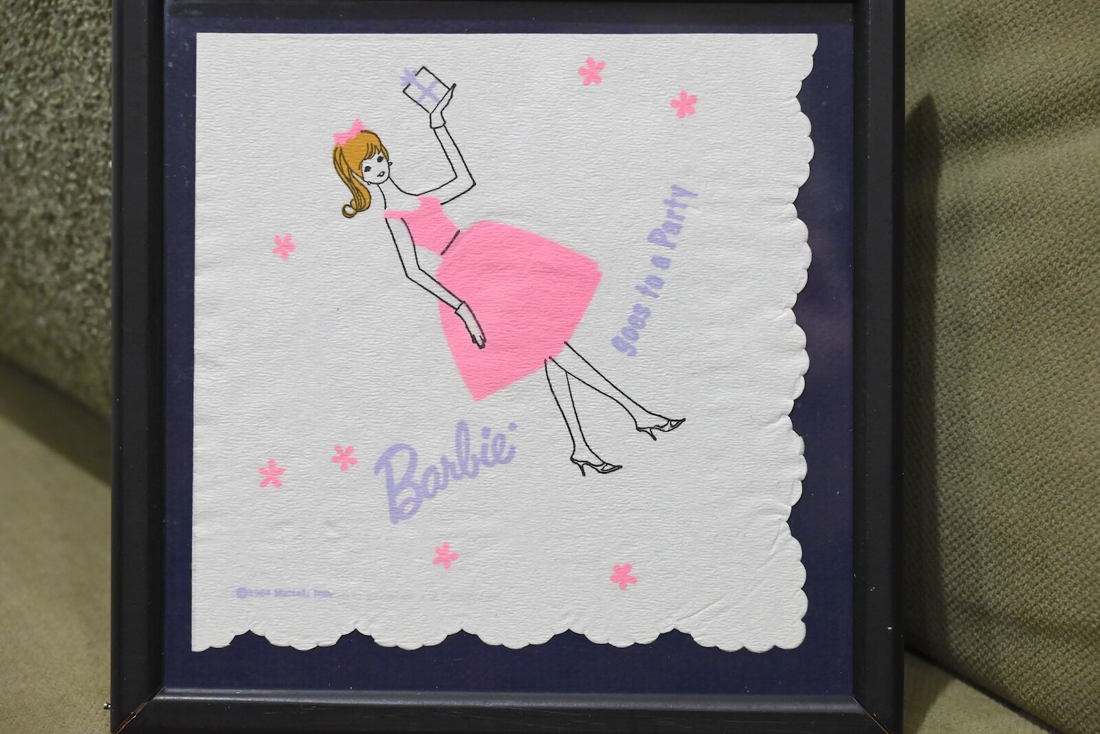 A Barbie cocktail napkin