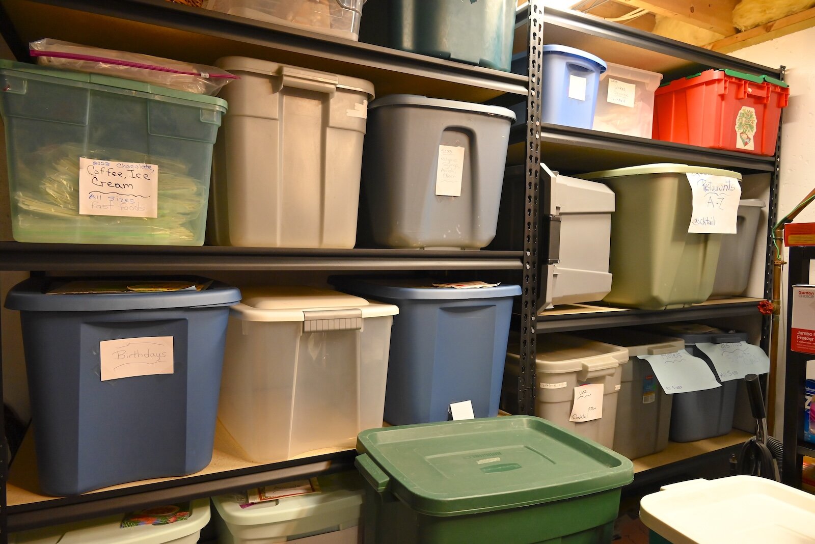 Bins containing Cathy Campbell's collection of napkins