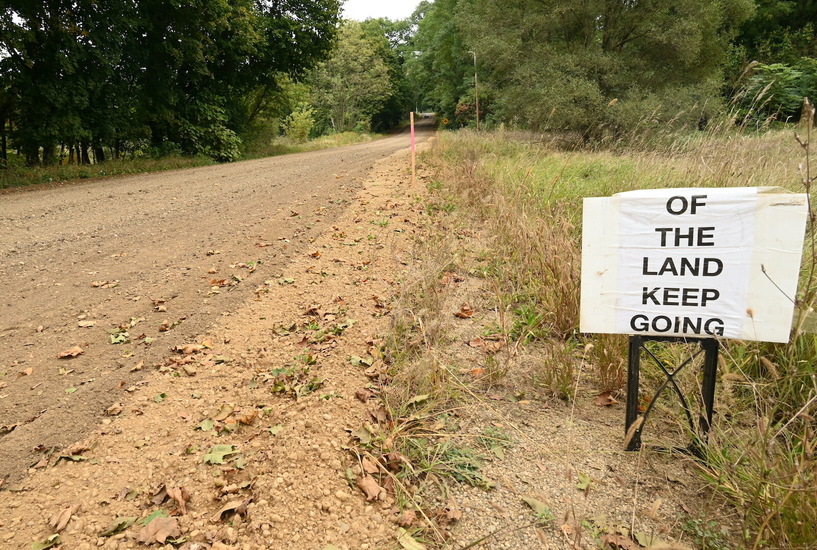 Signs point to Of The Land on H Drive North between Marshall and Battle Creek.