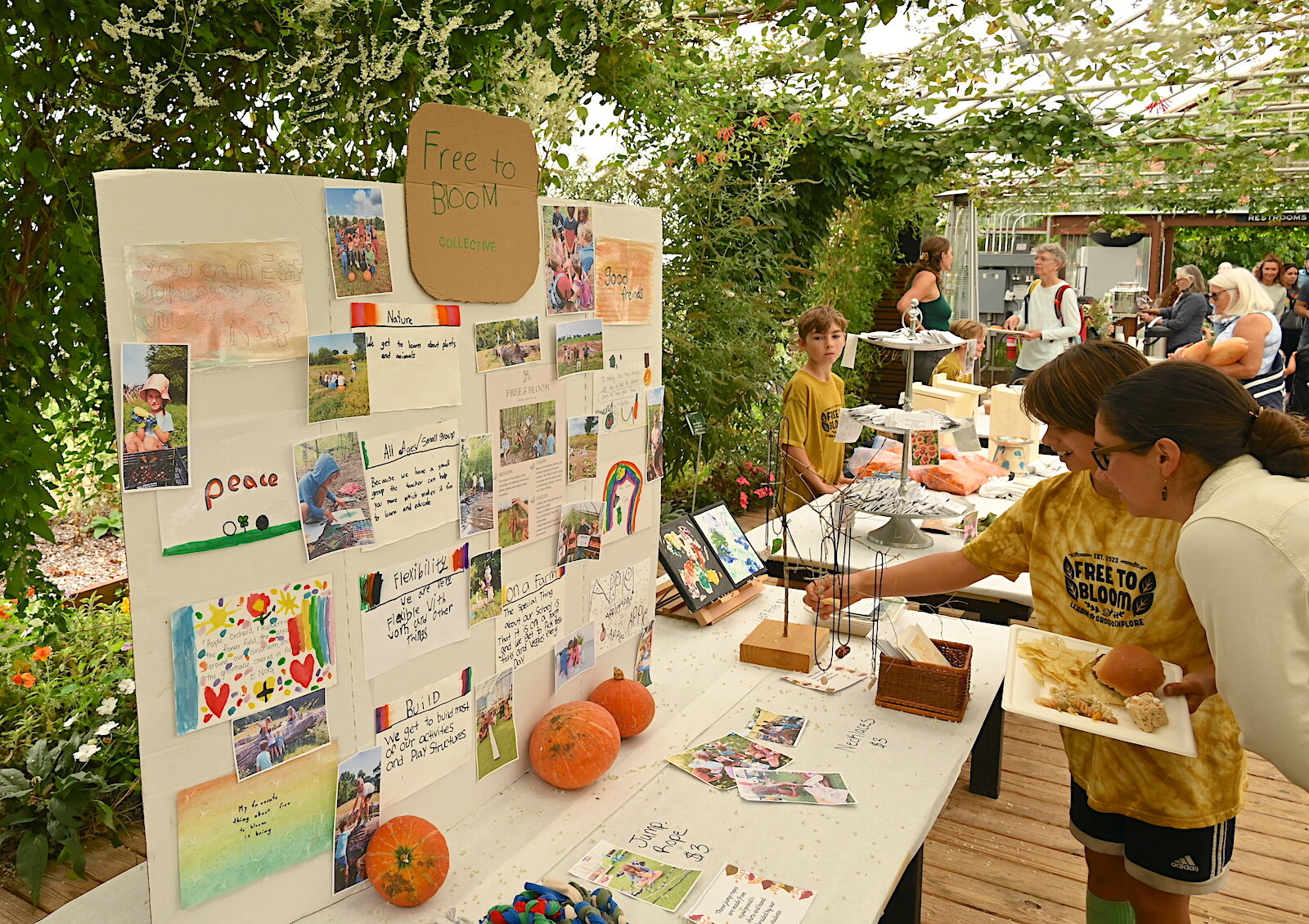 Free To Bloom, a home school collective, had informational displays at Of The Land’s harvest festival.