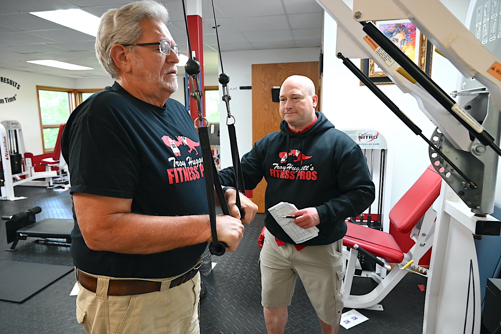 Troy Huggett works with client Chuck Crider on various stations.