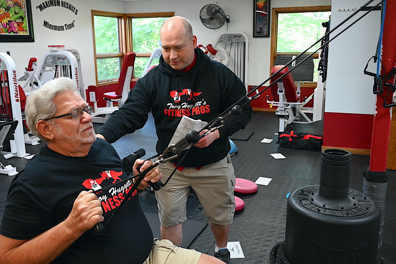 Troy Huggett works with client Chuck Crider on various stations.