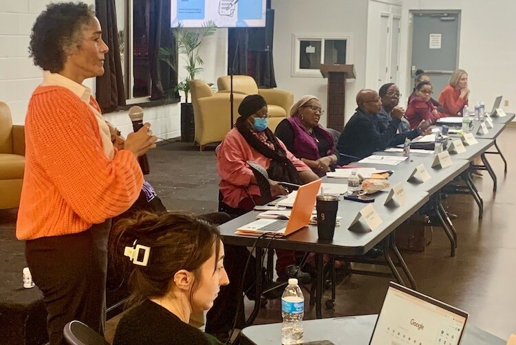 Executive Director Elizabeth Washington talks about four newly built Ransom Street houses during the Tuesday, Nov. 19, 2024 meeting of the Northside Association for Community Development.