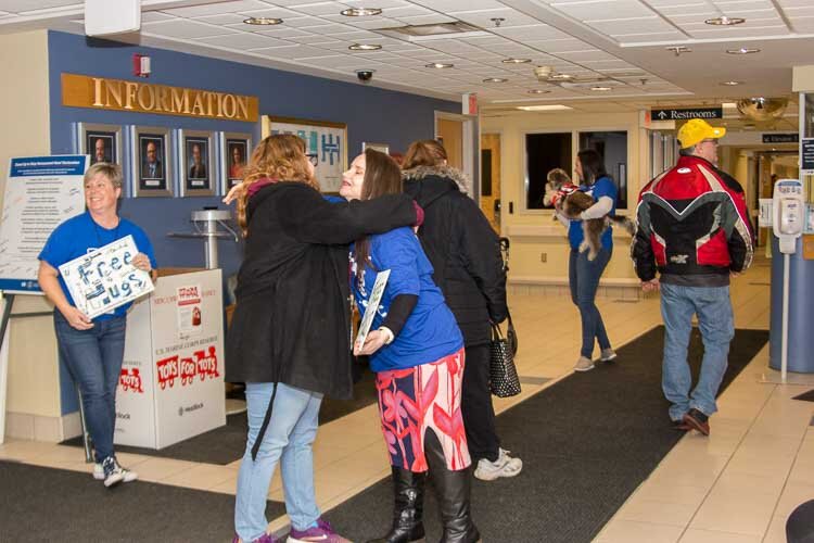 There were lots of human hugs when volunteers in the Hug Ambassadors Program recently offered hugs to veterans at the VA in Battle Creek.