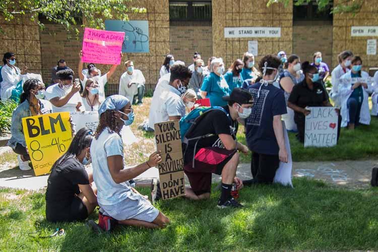 More than 100 staff at Family Health Center gathered to take a knee for 8 minutes and 46 second in honor of George Floyd and to promote racial justice and equity. 