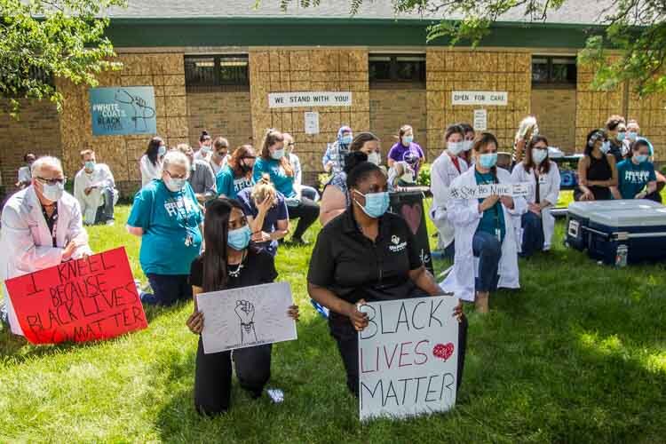 More than 100 staff at Family Health Center gathered to take a knee for 8 minutes and 46 second in honor of George Floyd and to promote racial justice and equity. 