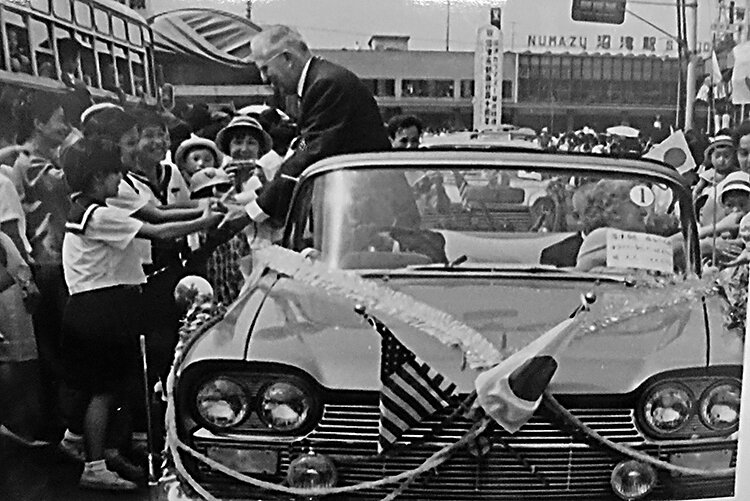 Kalamazoo Mayor Paul Morrison is surrounded by parade spectators during his visit in 1963.