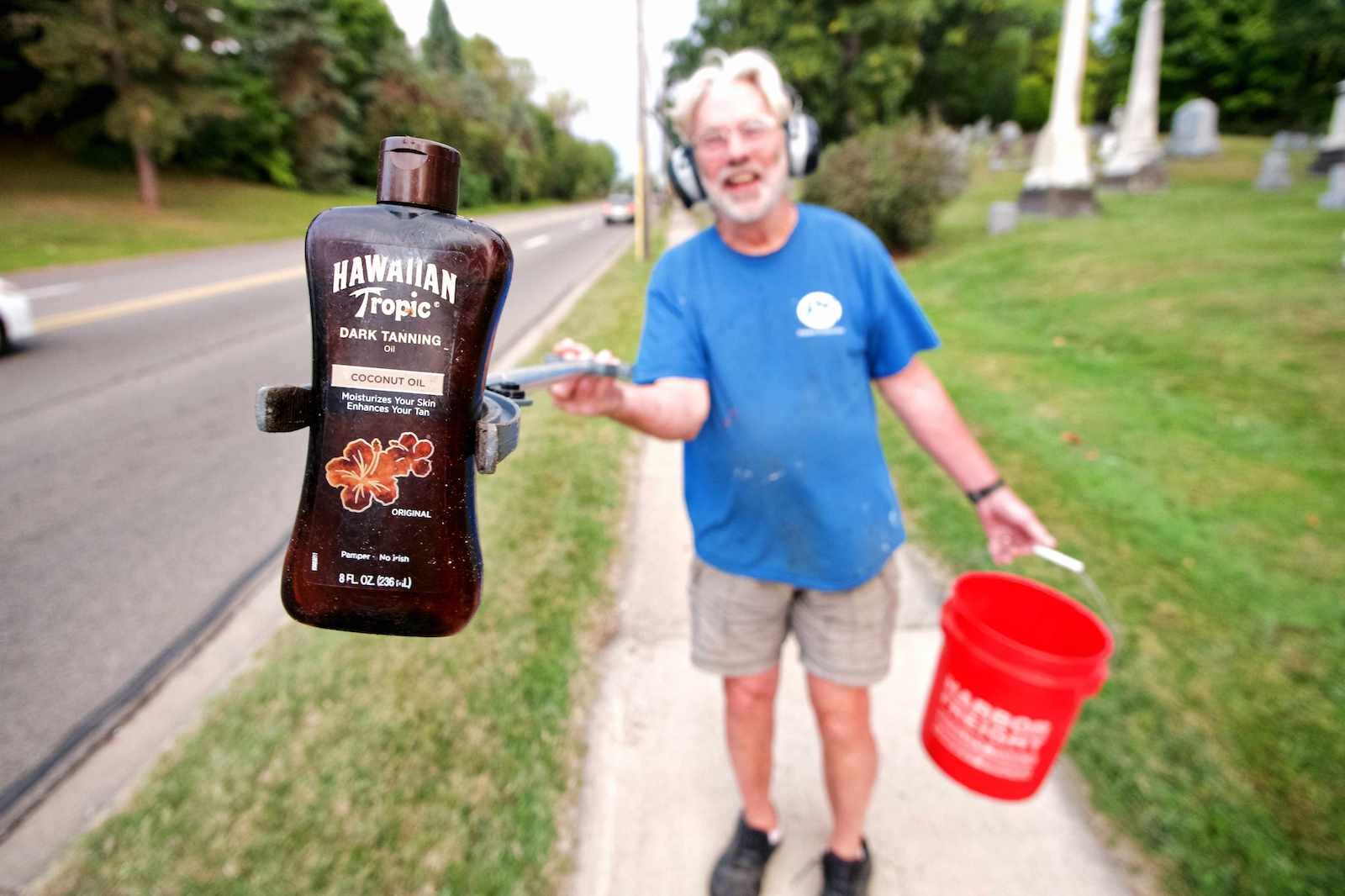  Thomas Kostrzewa, a Western Michigan University professor who lives on Prospect takes regular litter-collecting treks along West Main.