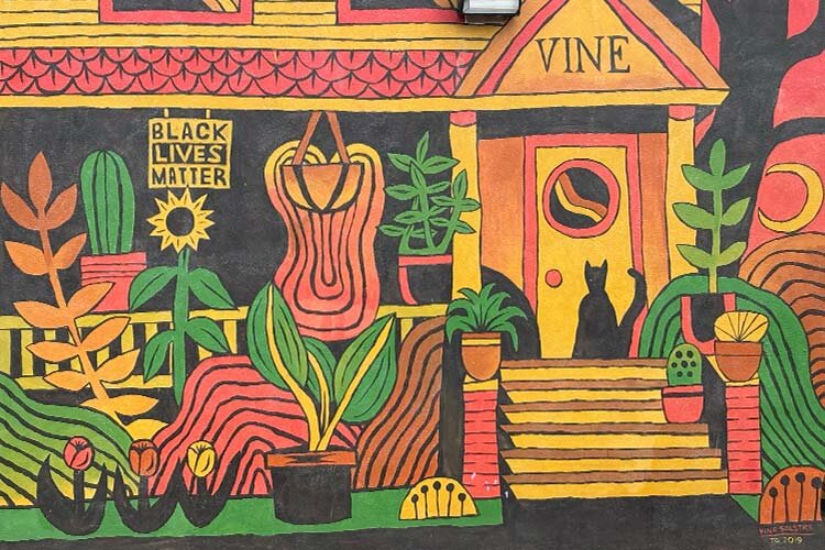 A mural on the side of the Vine Neighborhood Association.