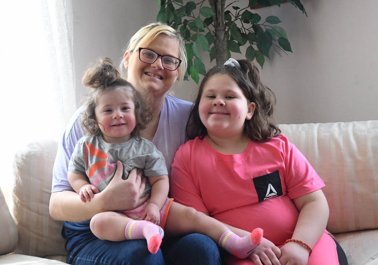 Charlie-Jo Sauceda, a recent graduate of The Haven’s Women’s Life Recovery Program is seen with her two children, Leila, 16 months, left, and Lila-Rose, 8.