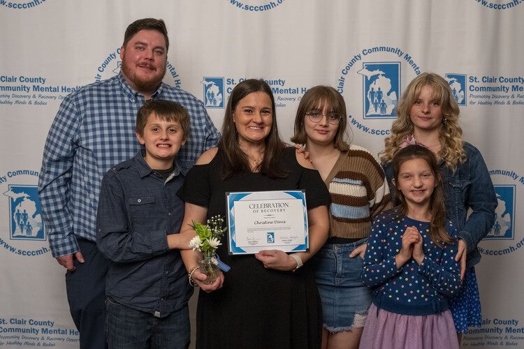 Christine Davis (middle) and Family.