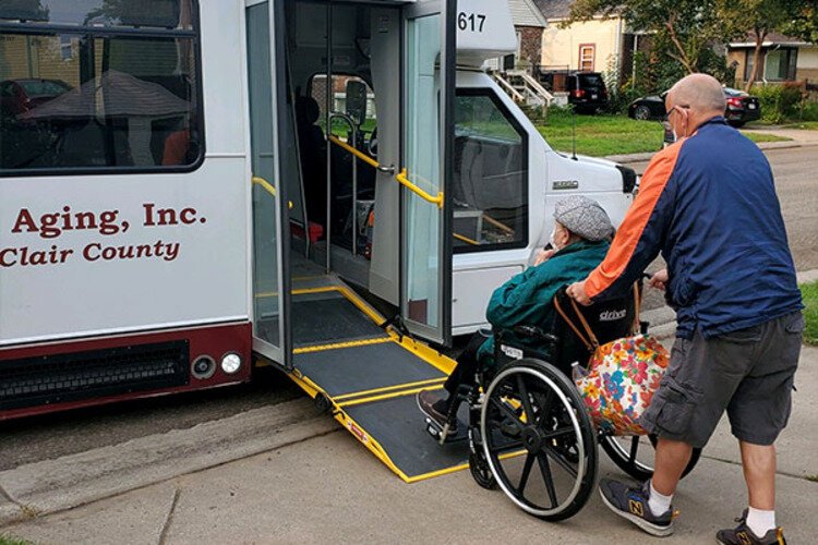 Passengers loading on a COA bus in Port Huron.