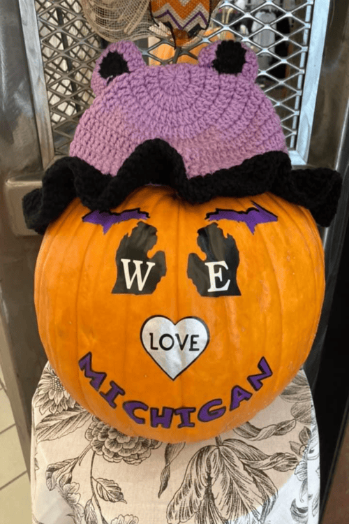 Pumpkin painted by Marlo Ellis, hat created by artist Gal Lee Olson.