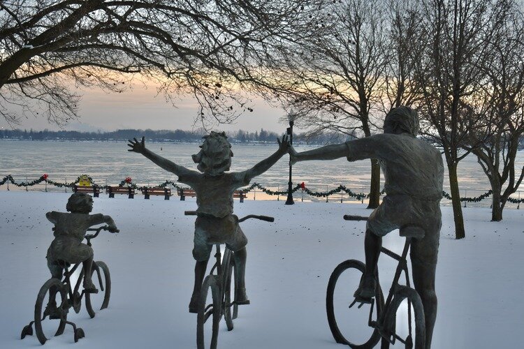 The Free Wheelin' statue at Palmer Park in St. Clair, MI welcomes a rose-stained dawn.