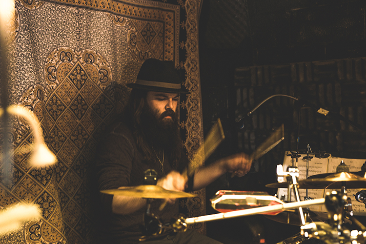 Joe displays his drumming skills.