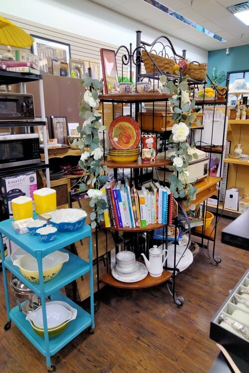 Display of cooking ware inside Soaring Dreams.