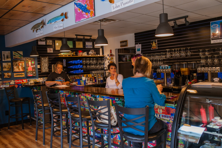 Patrons enjoy a break at the Blue Pike Cantina in Marine City.