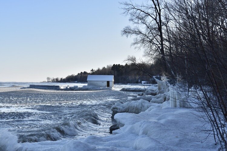 Lake Huron crashing shards of ice into the beach near Lexington.