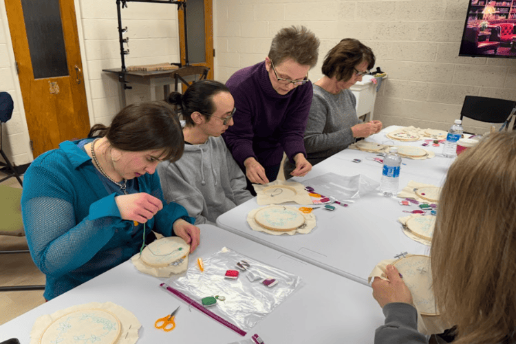 Local community members attend an embroidery class at the Make Saint Clair makerspace.