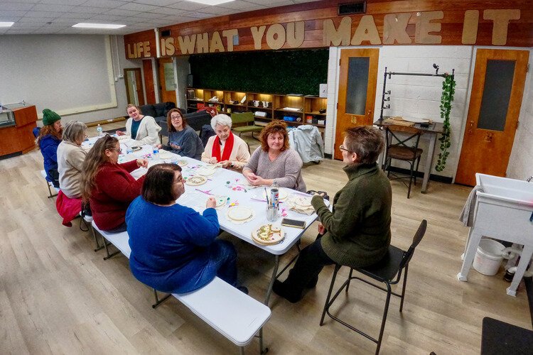 Lori Weatherly teaches an embroidery class at the Make Saint Clair makerspace in the Eddy Center.