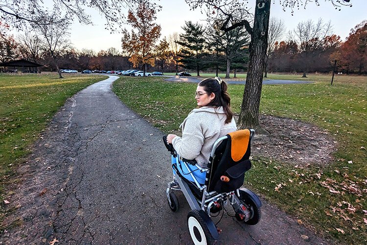 Marisa Spain, 27, is a power wheelchair user with Facioscapulohumeral muscular dystrophy (FSH), a progressive hereditary disease that causes muscle weakness in several areas of the body.