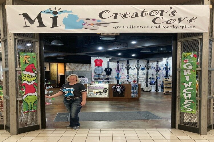 Marlo Ellis, owner of MI Creators Cove standing outside her store in Birchwood Mall.