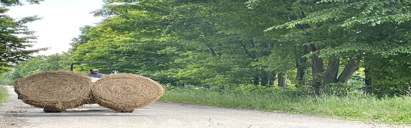 Hay bailer on a country road adjacent to the James and Alice Brennan Nature Sanctuary in St. Clair County.