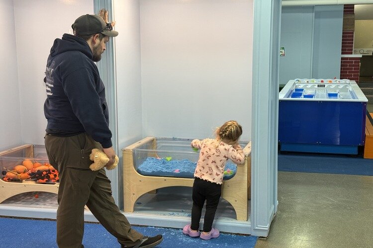 Michael Sheldon and his daughter Ember inside Port Huron's new Discovery City Children’s Museum.