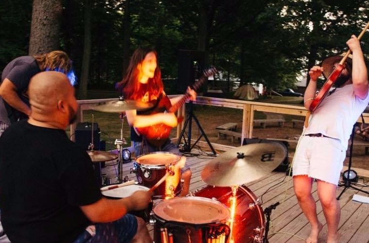 Jamming with the band outdoors is a lot of fun.