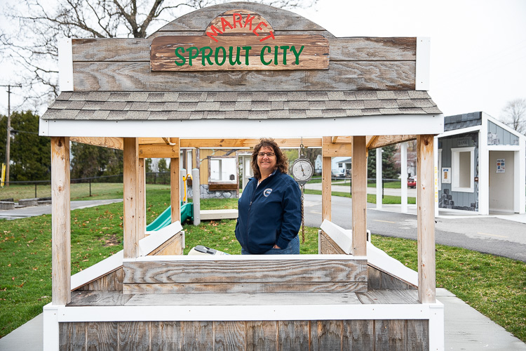 Parks and Recreation Director Nancy Winzer stands inside the Sprout City Market.