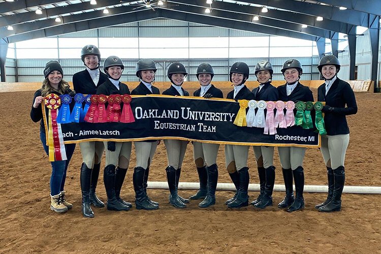 Oakland University's equestrian team poses for a photo.