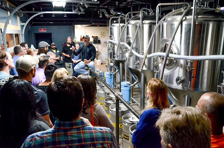 Kris Paul, founder of War Water Brewery, took the group on a tour of his operation.