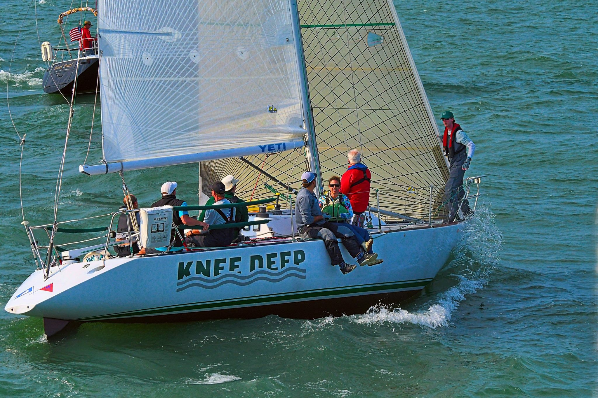 Evan Wilkins and crew aboard Knee Deep.