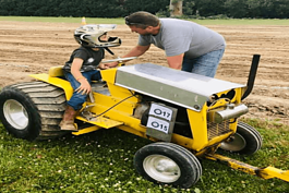 A participant on tractor at last years Berville Festival's Tractor Pull Competition.