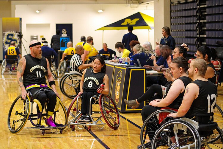 The Brampton Crashers discuss their gameplay at halftime during the Wolverine Invitational held at the SC4 Fieldhouse on Friday, Sept. 30, 2022.