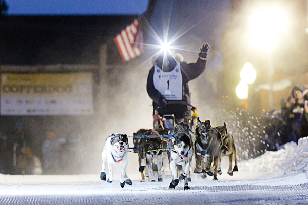 The first musher flies down the chute at the Copper Dog 150 Sled Dog Race, Calumet