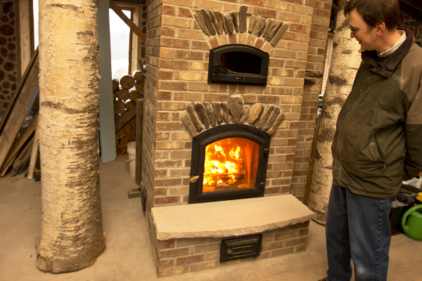 Greg and the new wood burner- -Shawn Malone