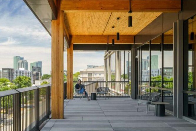 An apartment balcony using mass timber.